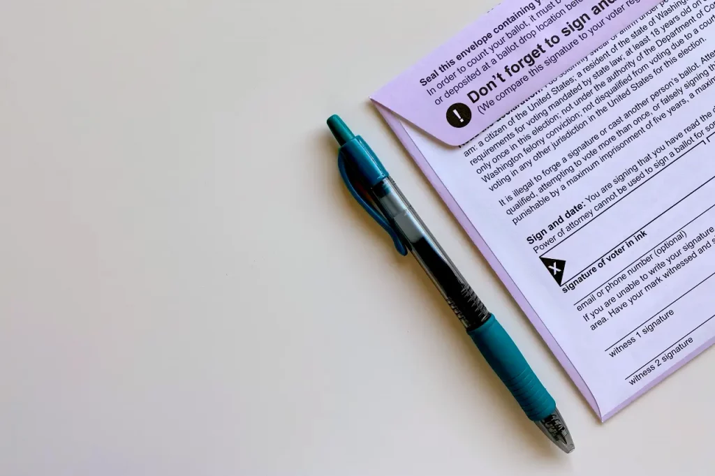 Hybrid voting background showing paper ballots and digital voting